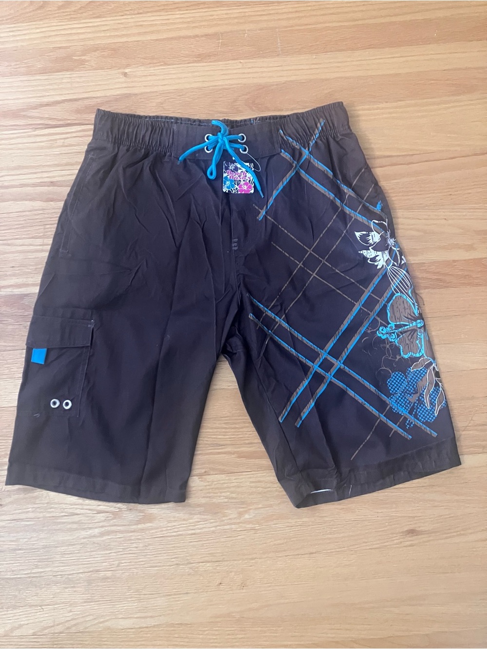 Dark brown and blue swim trunks